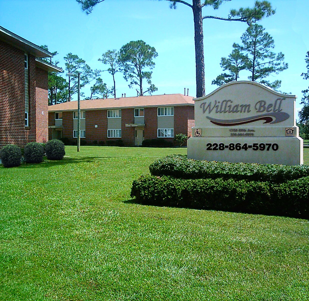 a picture of a building with a sign that says williams bell